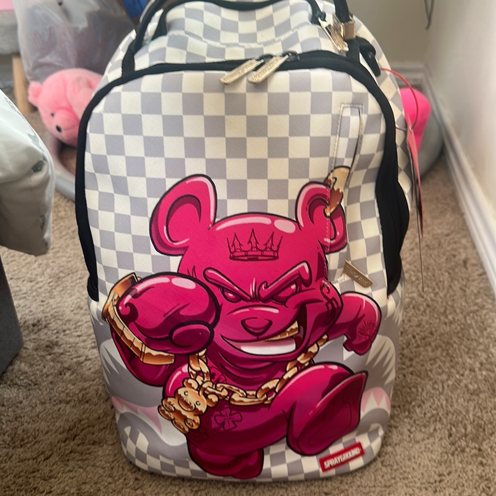 Spray ground white and grey checkered school bag with pink bear